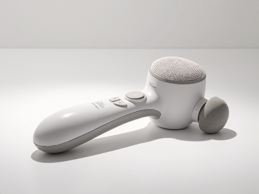 Electric cleaning brush device with ergonomic handle, silver metallic finish, soft grip texture, white plastic bristles, modern design, clean background